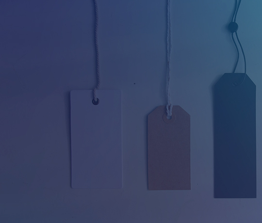 Various types of product tags laid out in a line