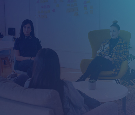 People sitting around a table brainstorming