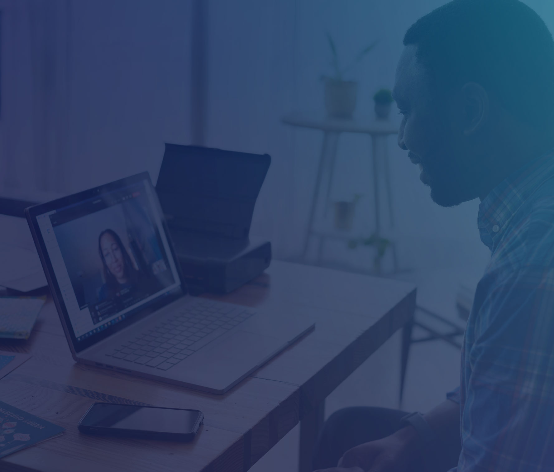Person watching a Blue Sky eLearn webinar on a laptop