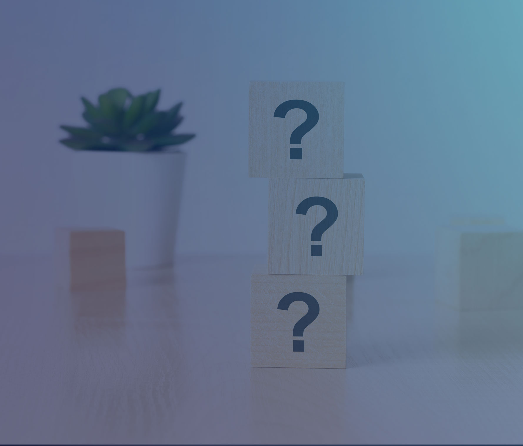 Three stacked blocks with question marks on them