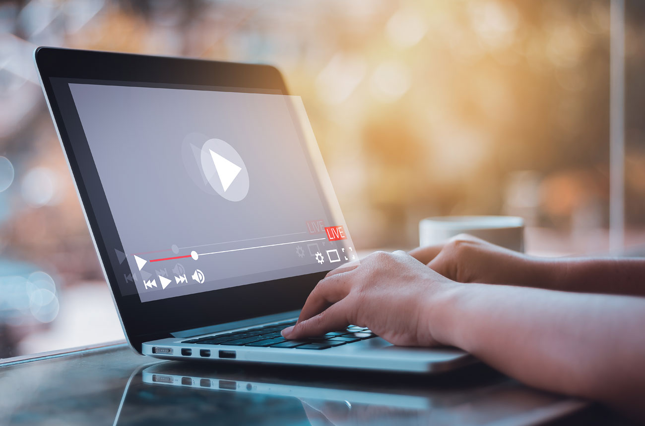 Video player on a laptop for virtual webinar management